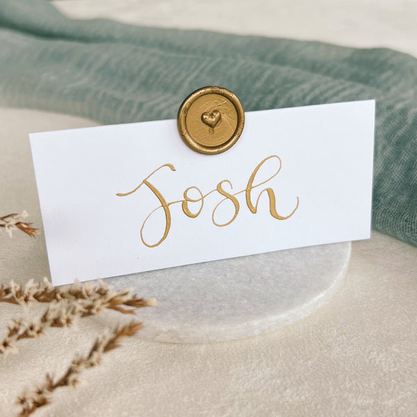 White place cards with wax seal