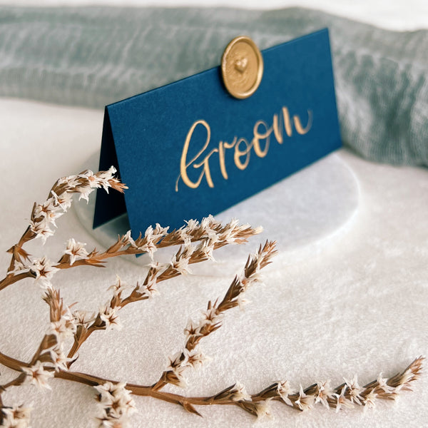 Navy place cards with wax seals