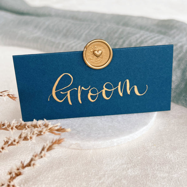 Navy place cards with wax seals
