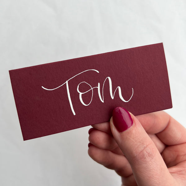 Burgundy calligraphy place cards