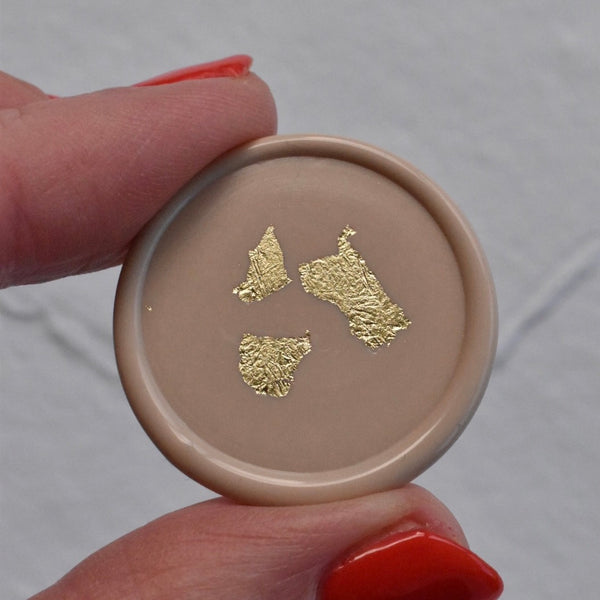 Gold flake wax seals