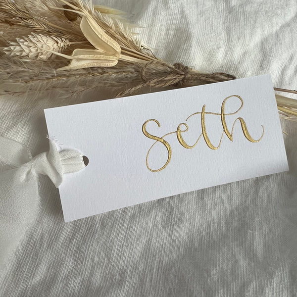 White flat place card with silk ribbon