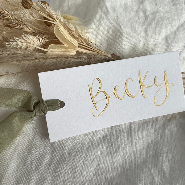 White flat place card with silk ribbon
