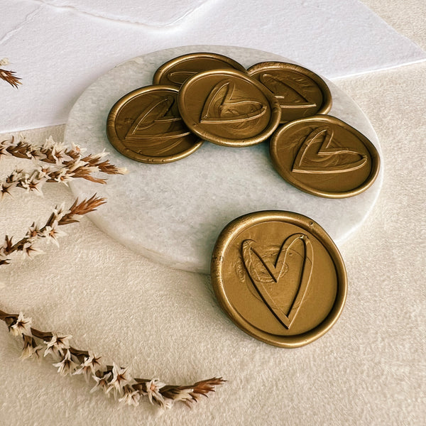 Gold wax seals with heart design