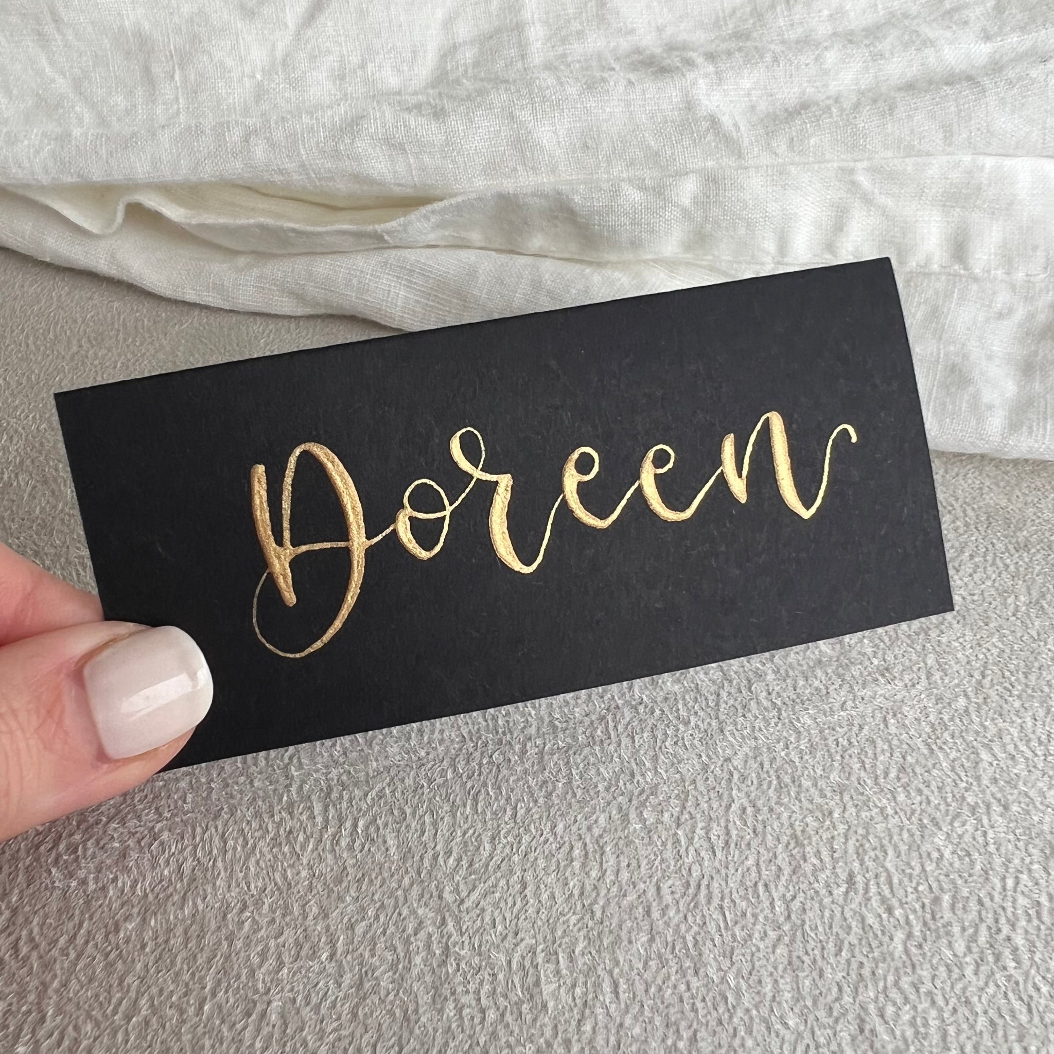 Black calligraphy place cards