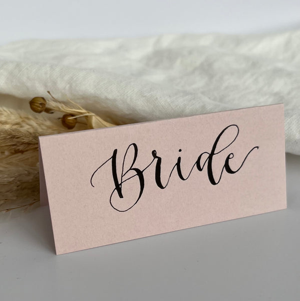 Blush pink calligraphy place cards