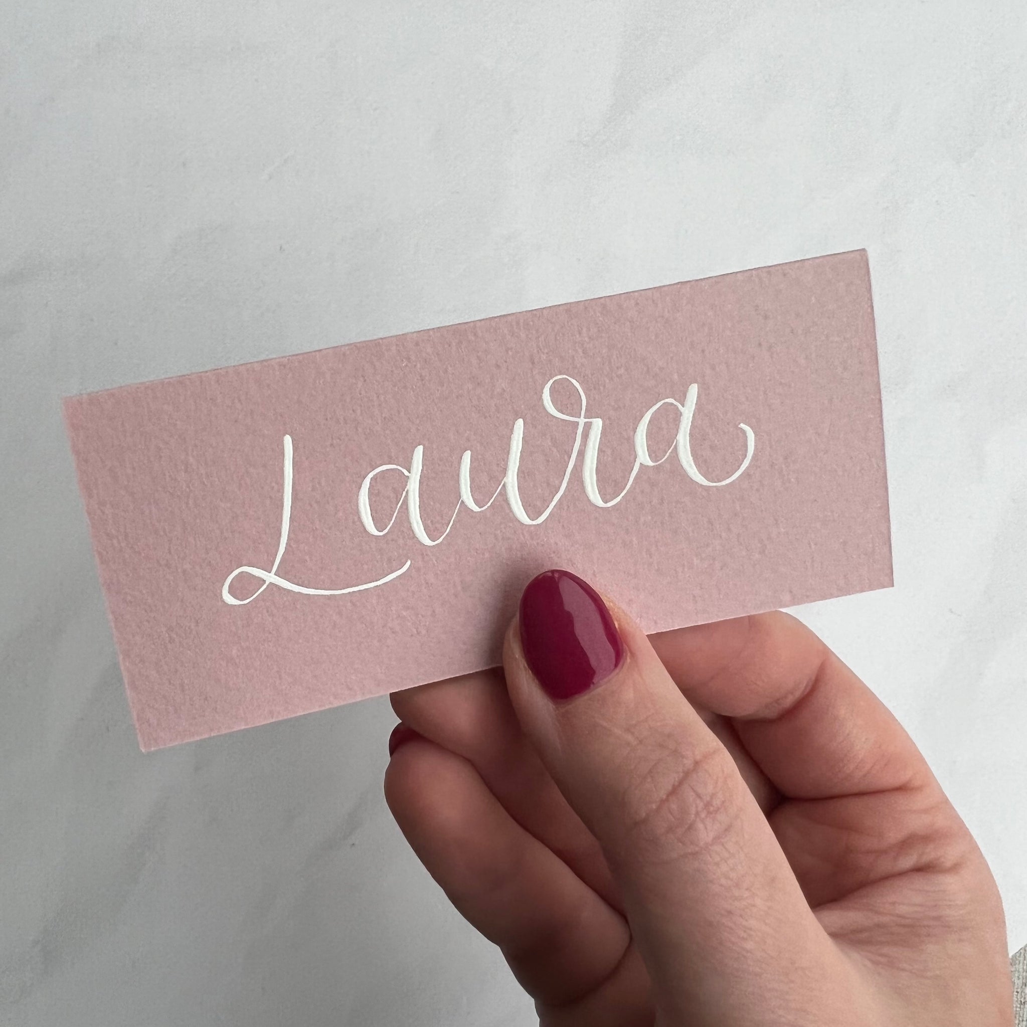Dusky pink calligraphy place cards