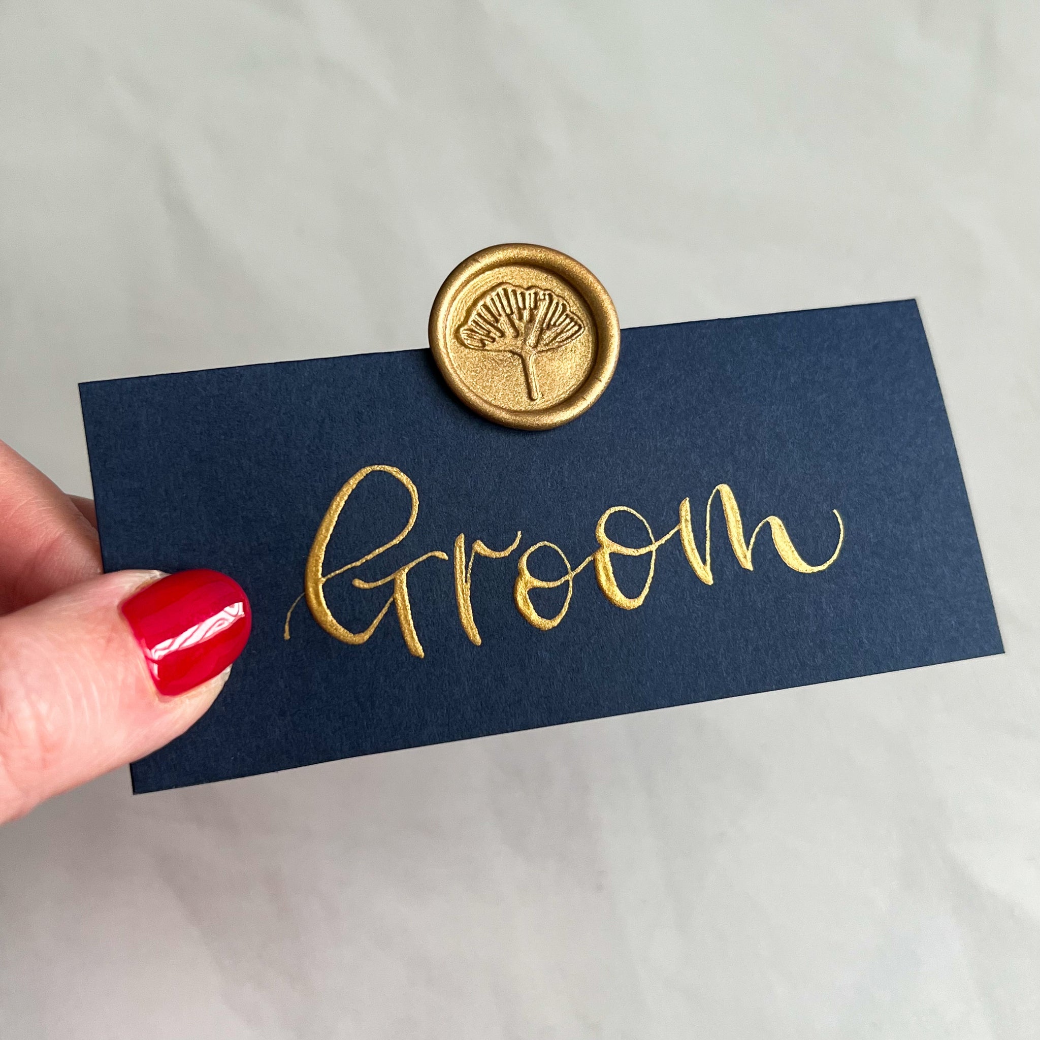 Navy place cards with wax seals